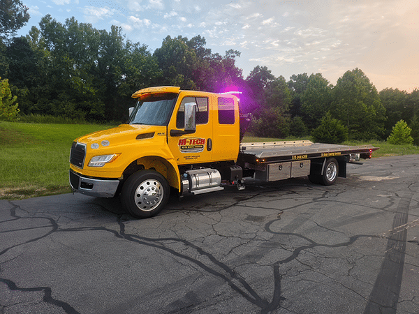 Hitech's flatbed tow truck